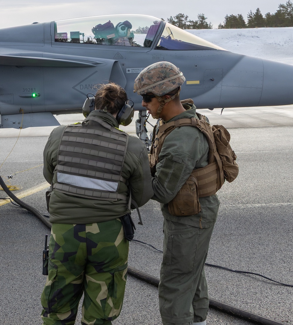 CORE26 | Swedish Soldiers, U.S. Marines Join Together to Fuel Aircraft in the Arctic