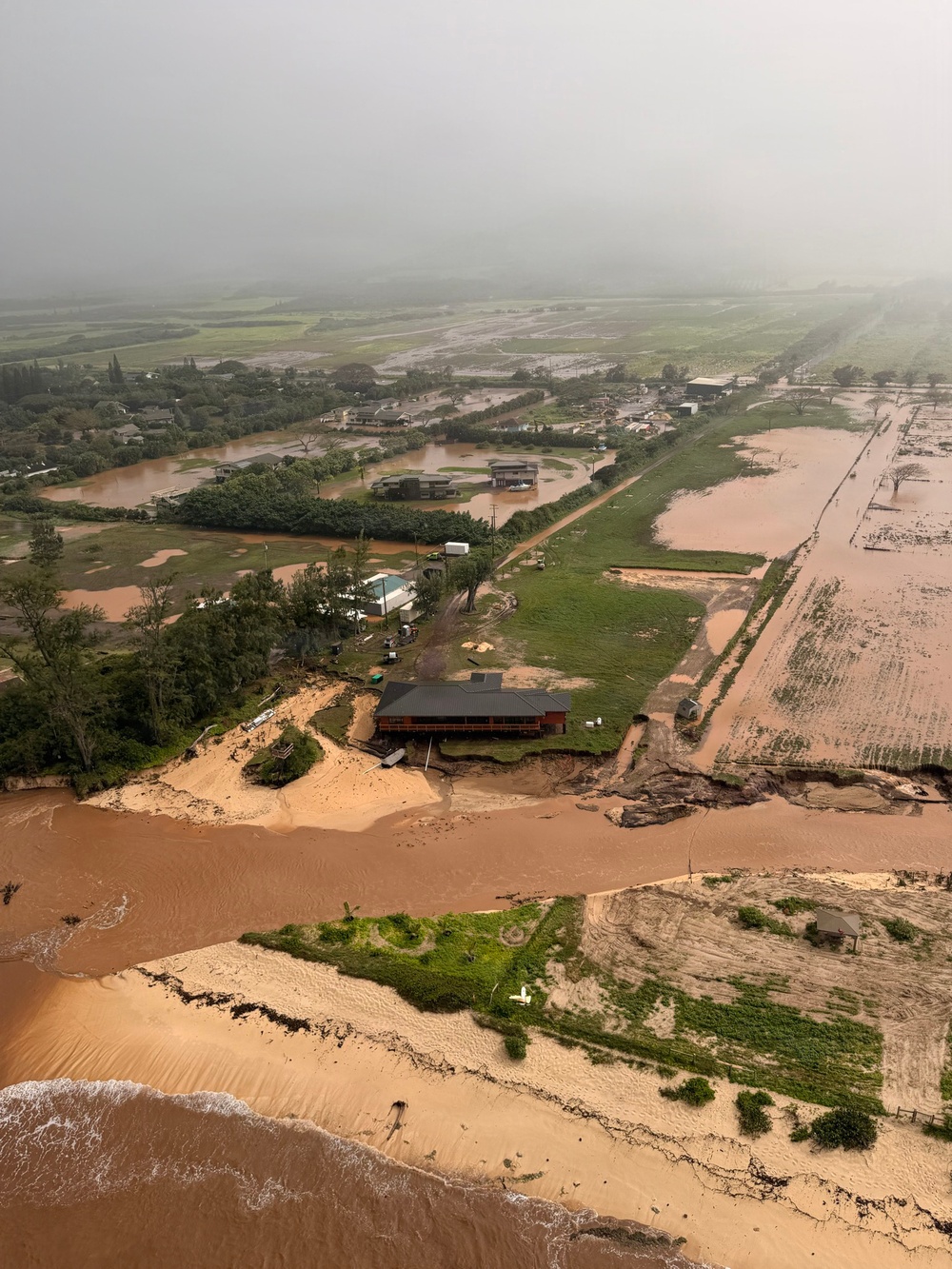 Coast Guard conducts overflight during flash floods on Oahu