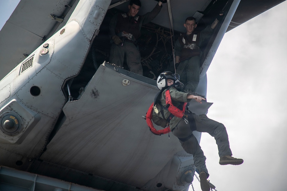 USS Tripoli Conducts Hoisting Exercise on Aircraft Elevator