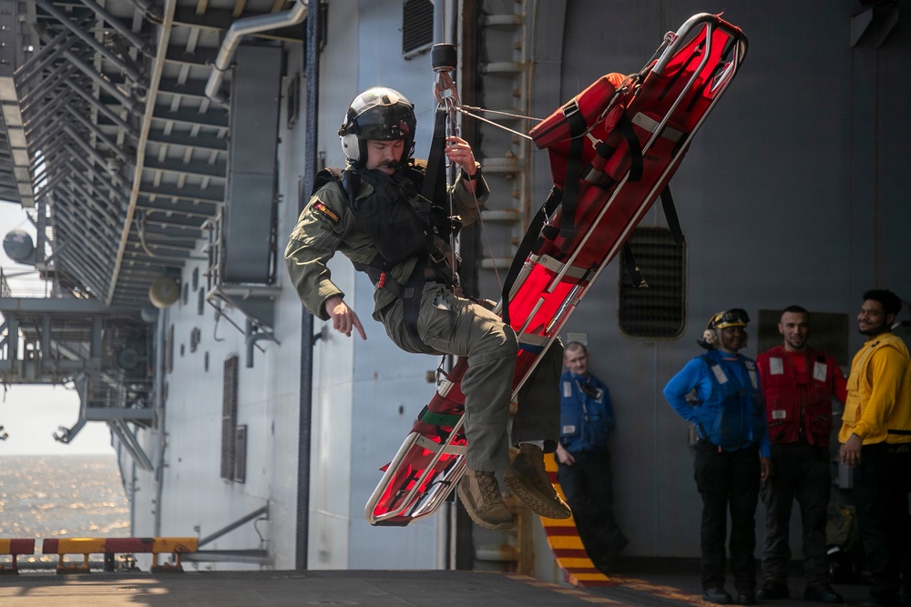USS Tripoli Conducts Hoisting Exercise on Aircraft Elevator