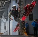 USS Tripoli Conducts Hoisting Exercise on Aircraft Elevator