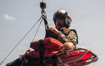 USS Tripoli Conducts Hoisting Exercise on Aircraft Elevator