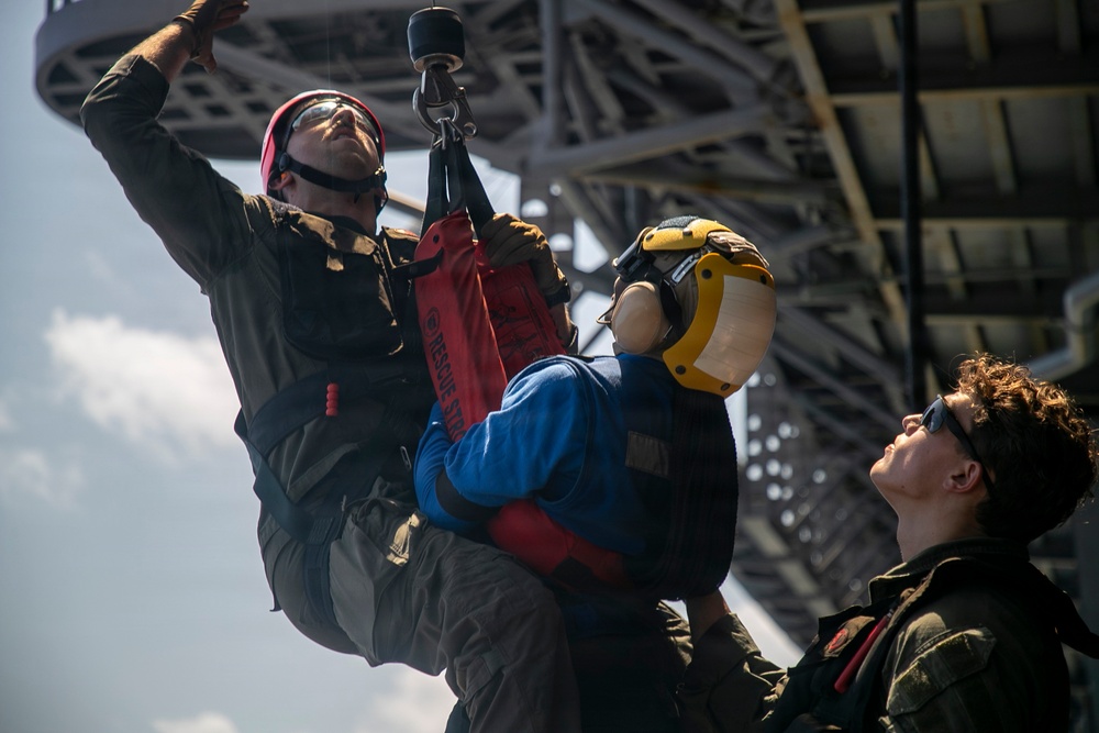 USS Tripoli Conducts Hoisting Exercise on Aircraft Elevator