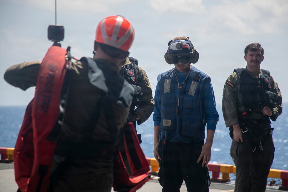 USS Tripoli Conducts Hoisting Exercise on Aircraft Elevator
