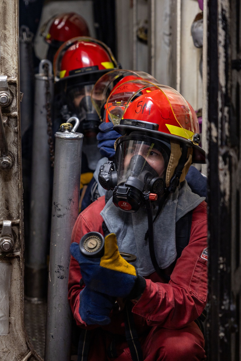 USS Iwo Jima Sailor Participate In An Integrated Training Environment