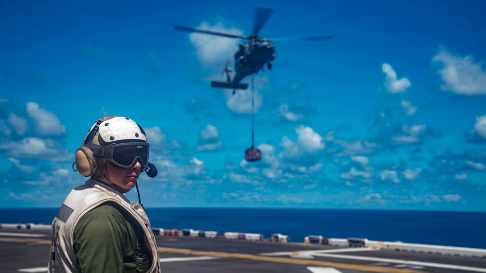 USS Tripoli Sailors Conducts Vertrep Training