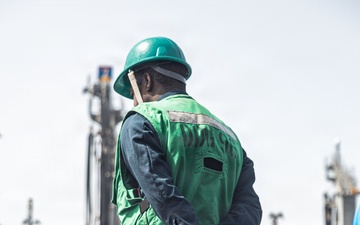 USS Bainbridge Conducts a Replenishment-at-Sea with USNS Kanawha During Operation Epic Fury