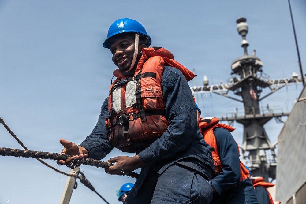 USS Bainbridge Conducts a Replenishment-at-Sea with USNS Kanawha During Operation Epic Fury