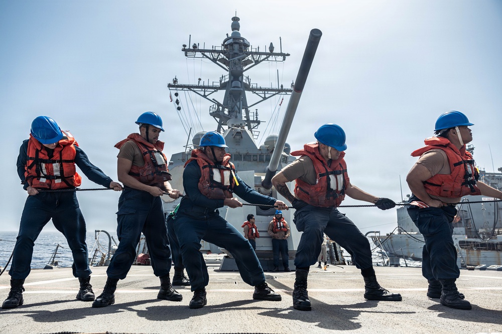 USS Bainbridge Conducts a Replenishment-at-Sea with USNS Kanawha During Operation Epic Fury