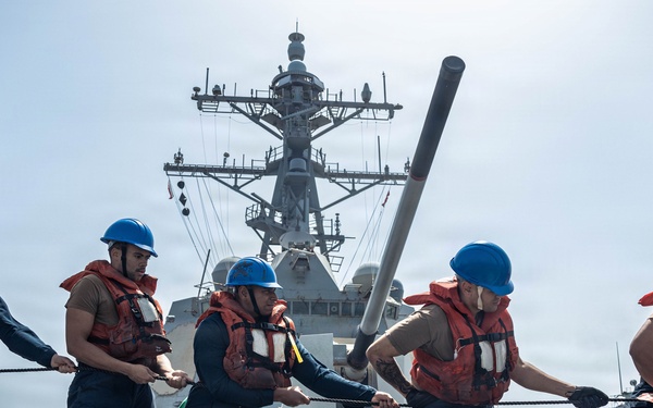 USS Bainbridge Conducts a Replenishment-at-Sea with USNS Kanawha During Operation Epic Fury