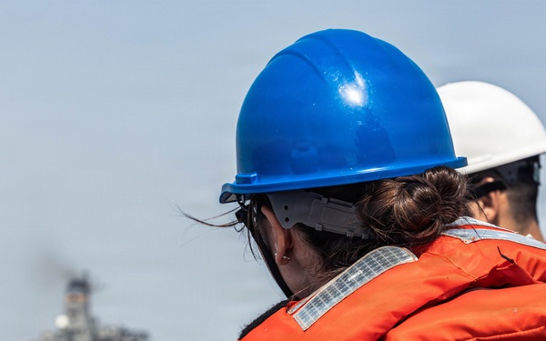 USS Bainbridge Conducts a Replenishment-at-Sea with USNS Kanawha During Operation Epic Fury