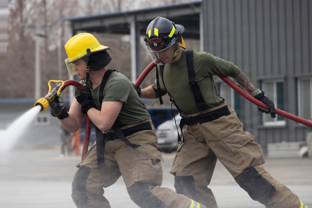 U.S. Marines participate in aircraft rescue and firefighting training