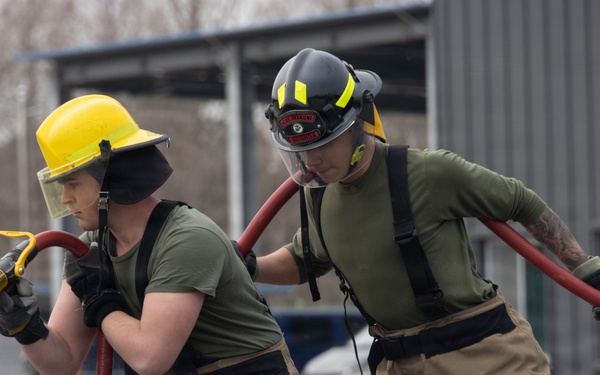 U.S. Marines participate in aircraft rescue and firefighting training
