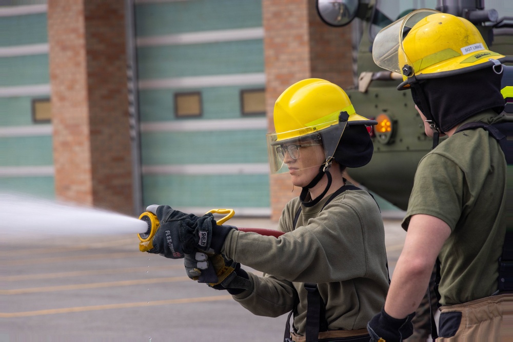 U.S. Marines participate in aircraft rescue and firefighting training