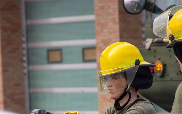 U.S. Marines participate in aircraft rescue and firefighting training