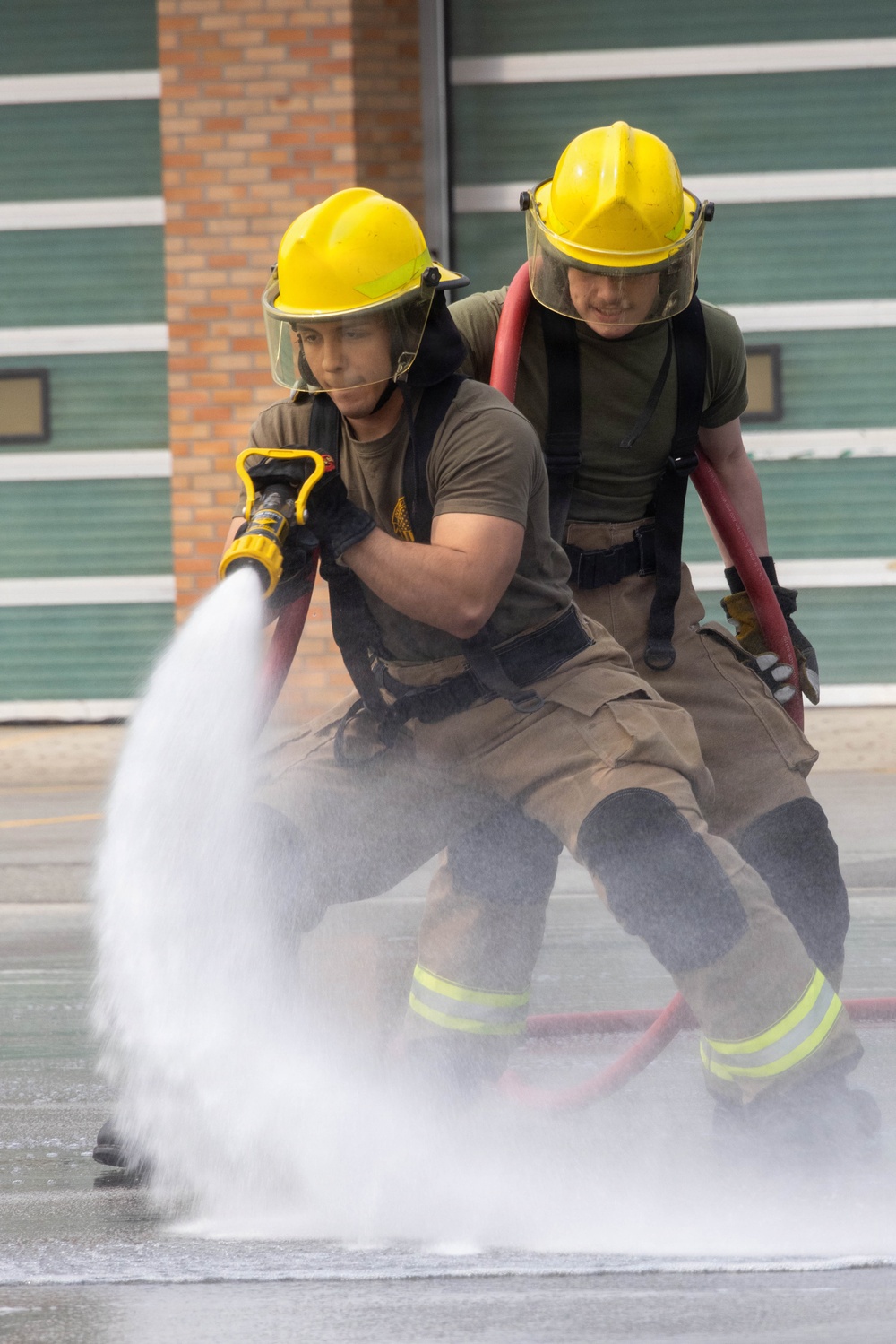 U.S. Marines participate in aircraft rescue and firefighting training