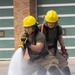 U.S. Marines participate in aircraft rescue and firefighting training