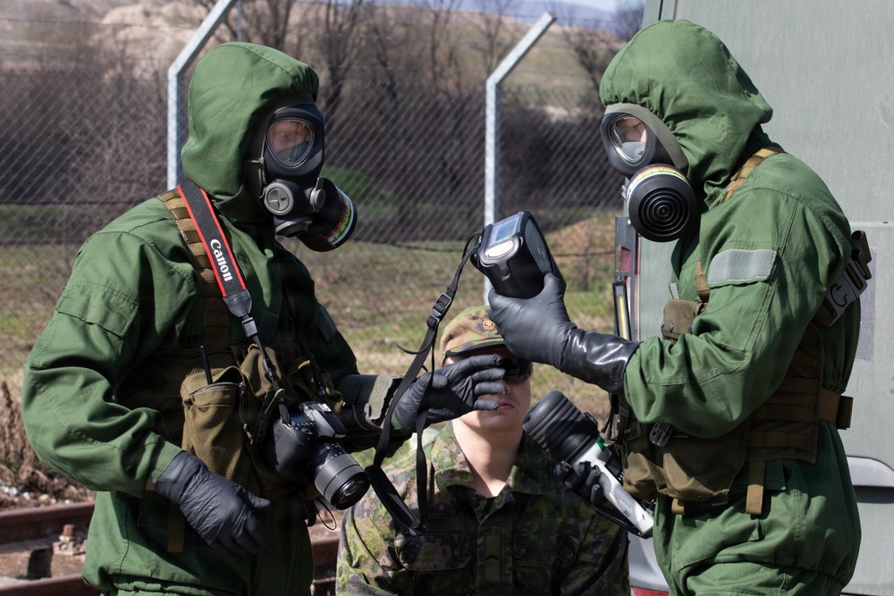 Finnish CBRN engineers inspect hazardous materials in support of KFOR