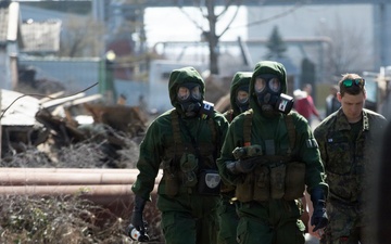 Finnish CBRN engineers inspect hazardous materials in support of KFOR