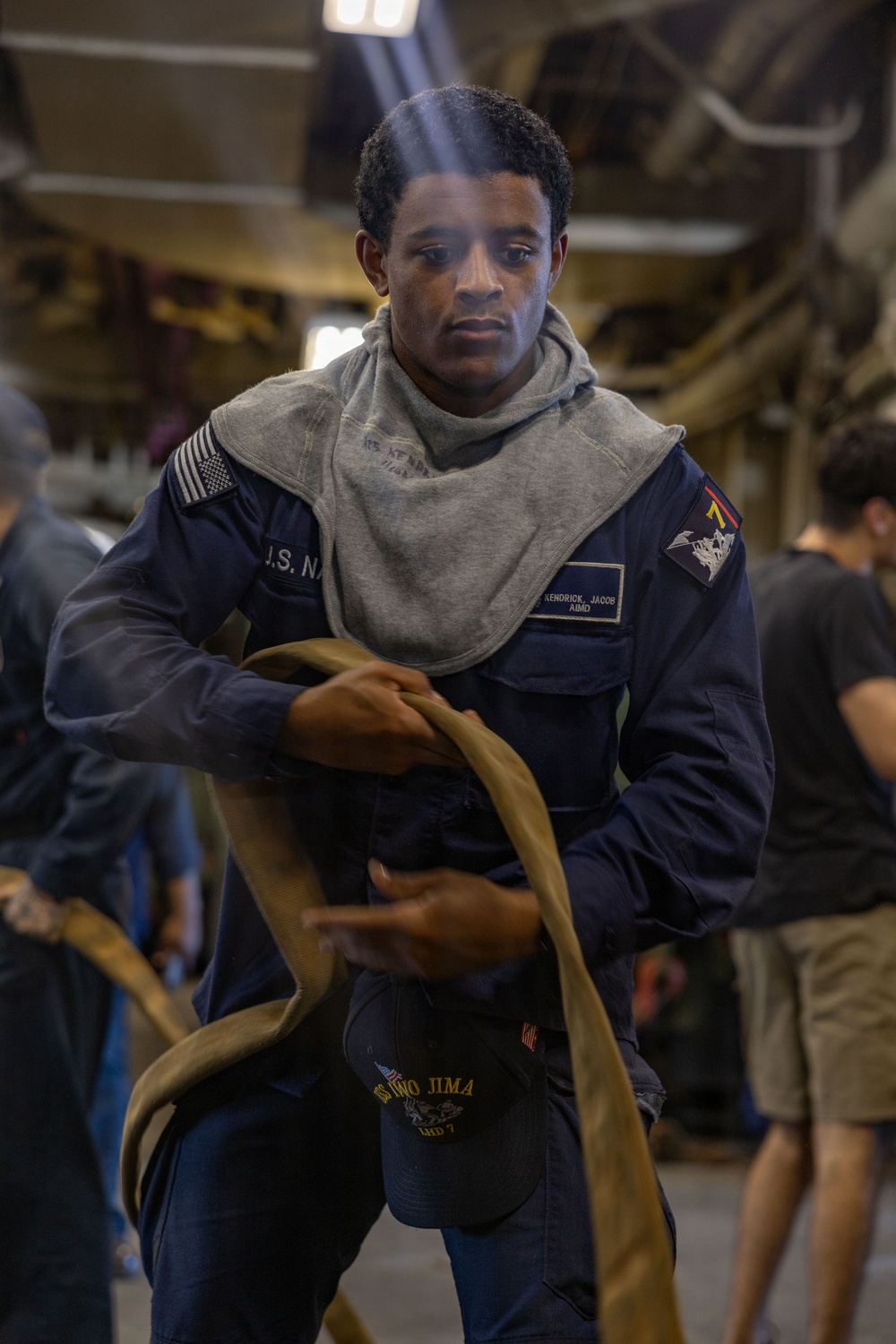 USS Iwo Jima Sailors Onload Ammunition