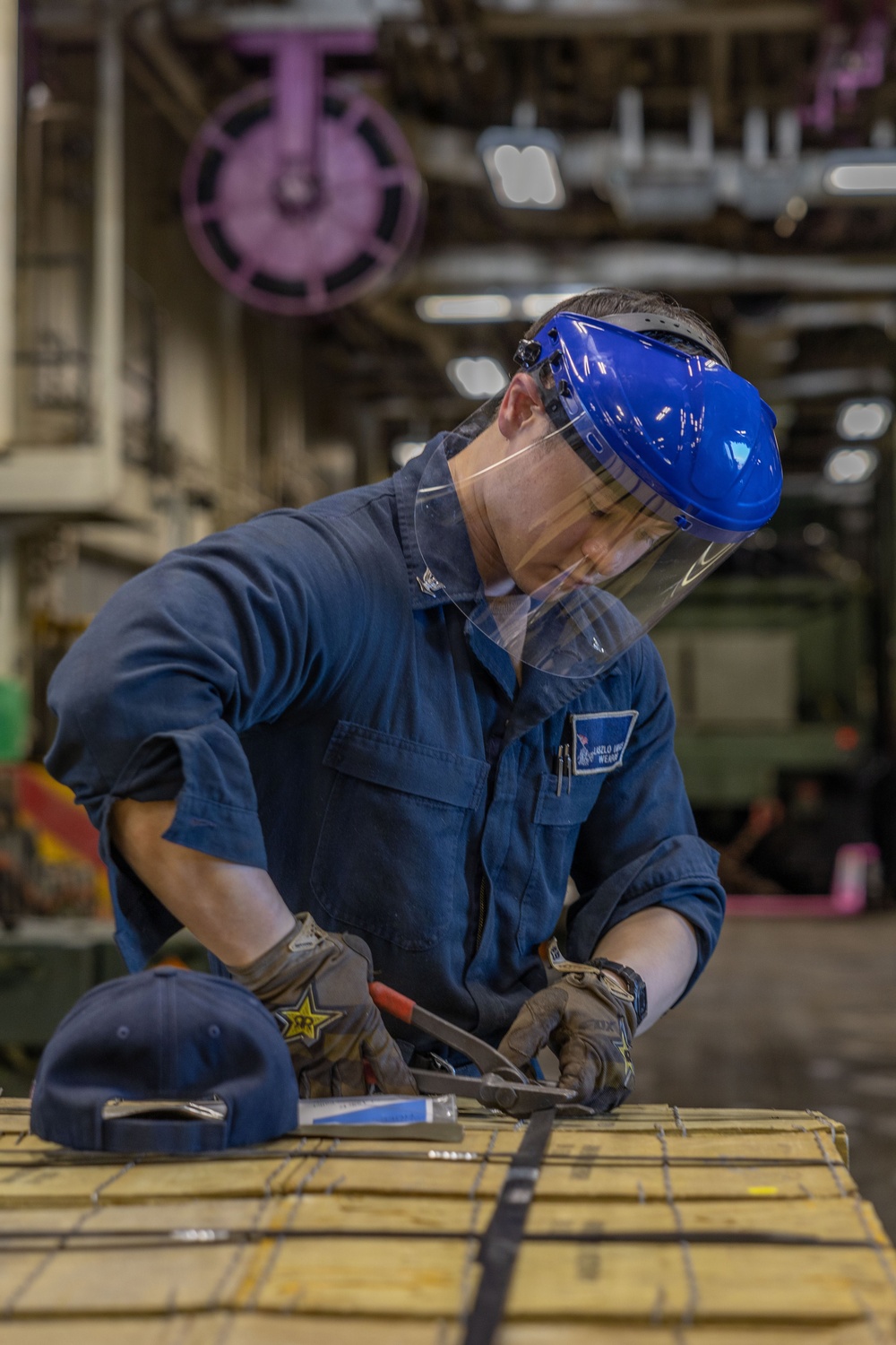 USS Iwo Jima Sailors Onload Ammunition