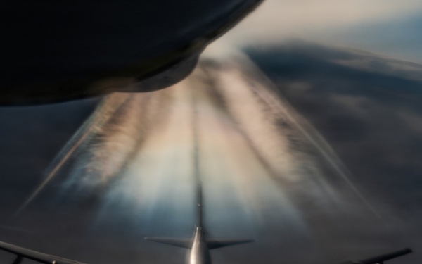 KC-135 Stratotanker aerial refuels B-52H Stratofortress during Operation Epic Fury
