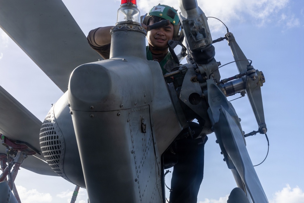 USS Iwo Jima Sailors Conduct Aircraft Maintenance