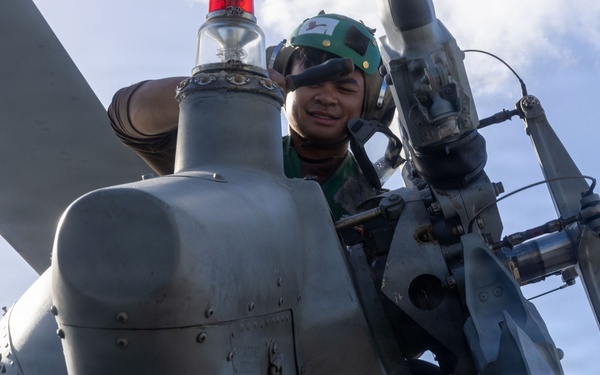 USS Iwo Jima Sailors Conduct Aircraft Maintenance