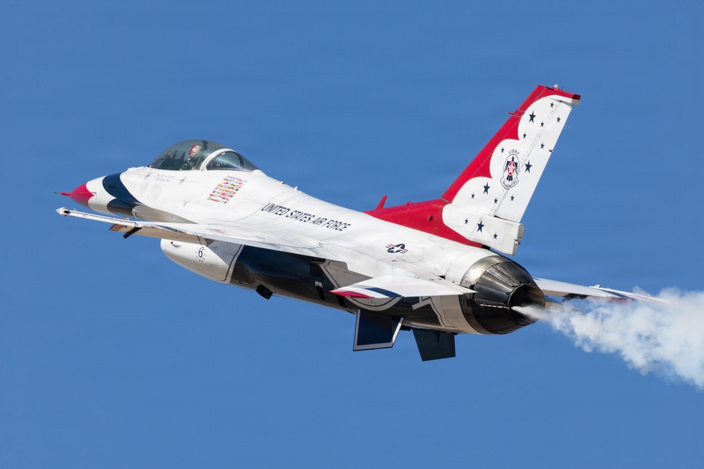 Thunderbird Six climbs high in the sky over Luke Air Force Base.
