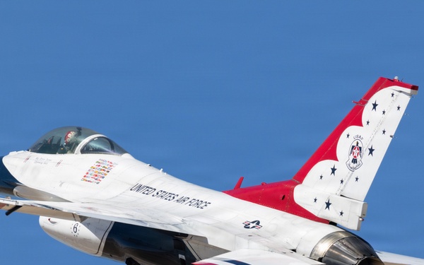 Thunderbird Six climbs high in the sky over Luke Air Force Base.