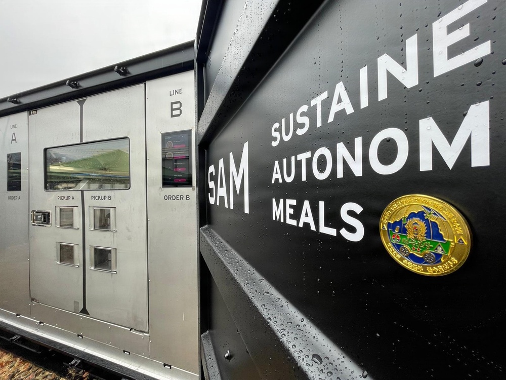 Containerized kitchen system supports field feeding