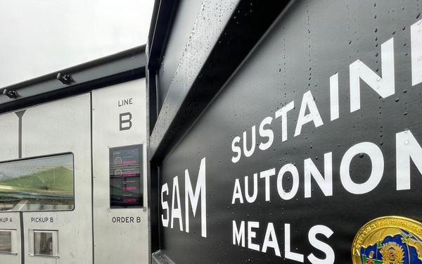 Containerized kitchen system supports field feeding