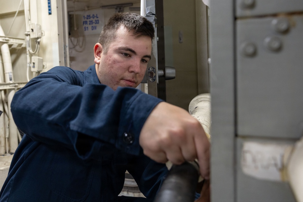 Sailors and Marines Aboard USS Portland Conduct Routine Operations