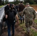 Governor, Adjutant General and state officials evaluate Waialua flood recovery