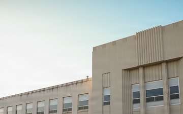 Sun rises over AFRL headquarters building