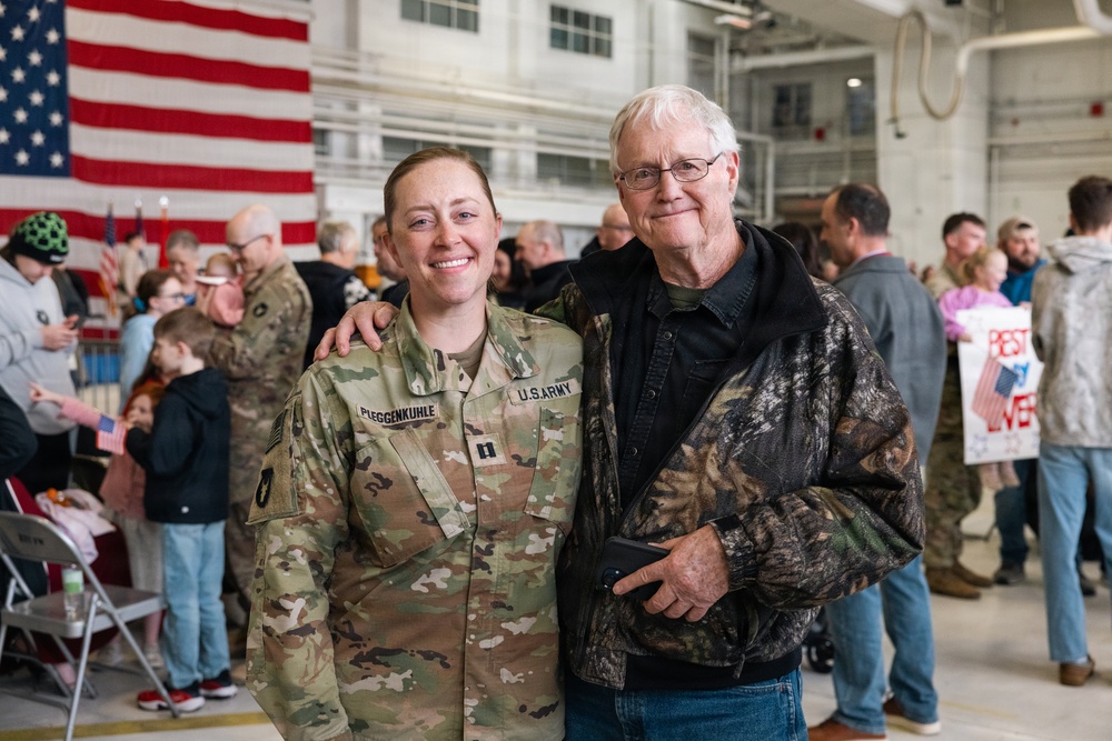 Iowa Soldier and Loved One Pose for Portrait