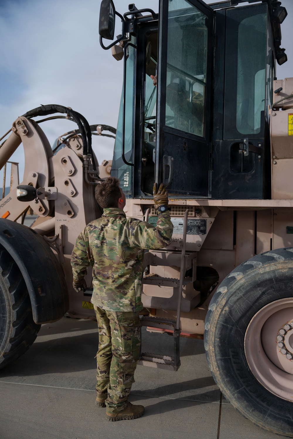 Ground Crews Marshal C-130 During Operation Epic Fury