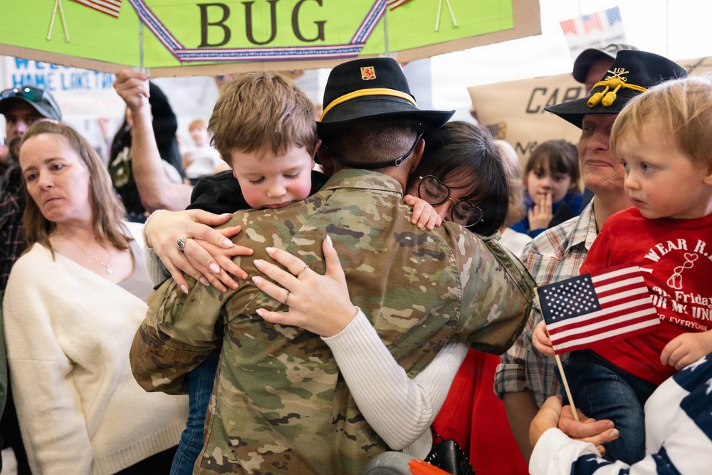 Iowa Soldiers is Embraced at Welcome Home Ceremony in Des Moines