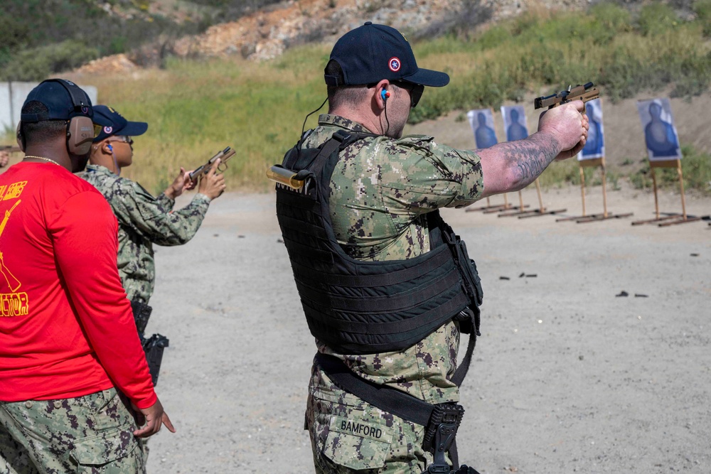 USS America (LHA 6) Sailors Conduct Small Arms Qualification Shoot