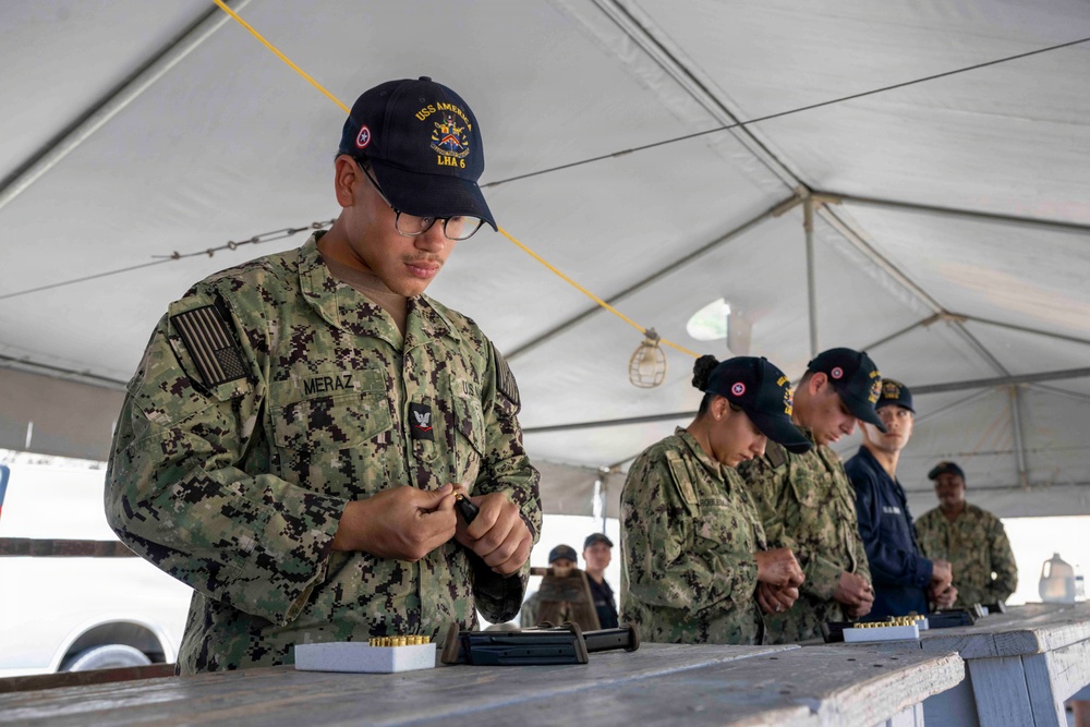USS America (LHA 6) Sailors Conduct Small Arms Qualification Shoot