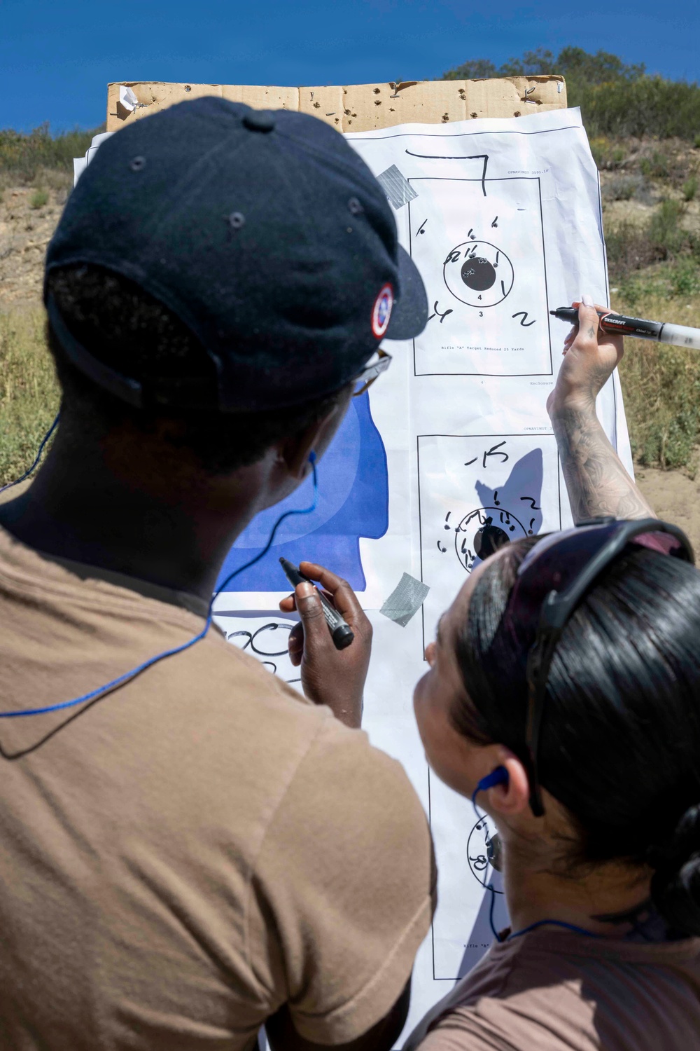 USS America (LHA 6) Sailors Conduct Small Arms Qualification Shoot