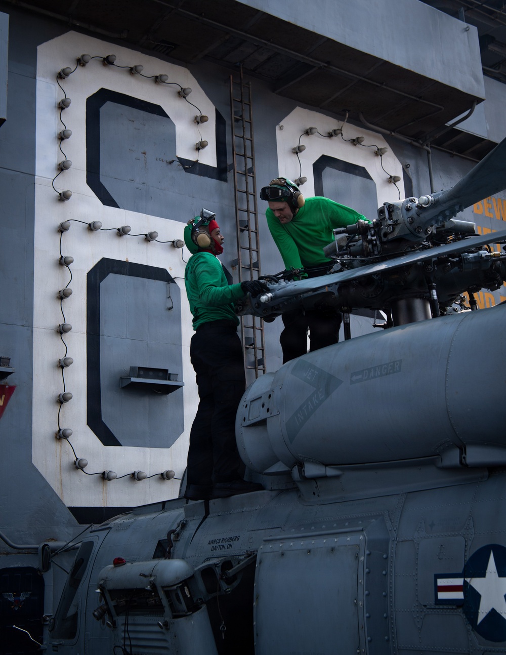 Nimitz Sailors Conduct Maintenance