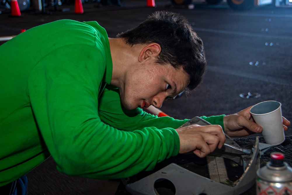 Nimitz Sailor Conducts Maintenance