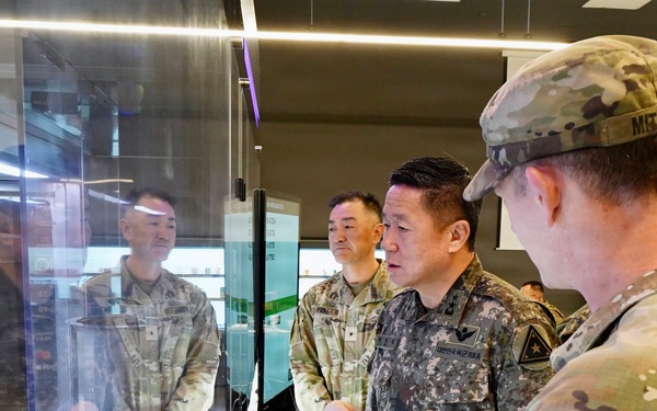 Leaders observe meal preparation process