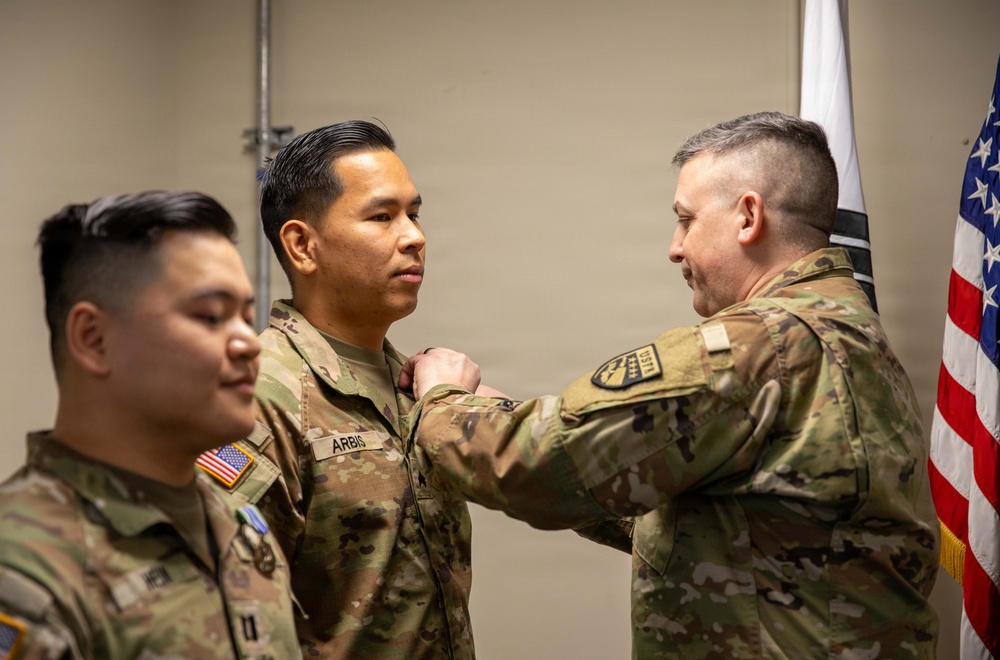 Capt. Donbosco A. Hein and Sgt. Eugene P. Arbis of the 498th CSSB received the Army Achievement Medal (AAM) from Maj. Gen. Justin W. Osberg, deputy combined rear area coordinator, United States Forces Korea (USFK) on Mar. 24.