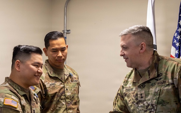 Capt. Donbosco A. Hein and Sgt. Eugene P. Arbis of the 498th CSSB received the Army Achievement Medal (AAM) from Maj. Gen. Justin W. Osberg, deputy combined rear area coordinator, United States Forces Korea (USFK) on Mar. 24.