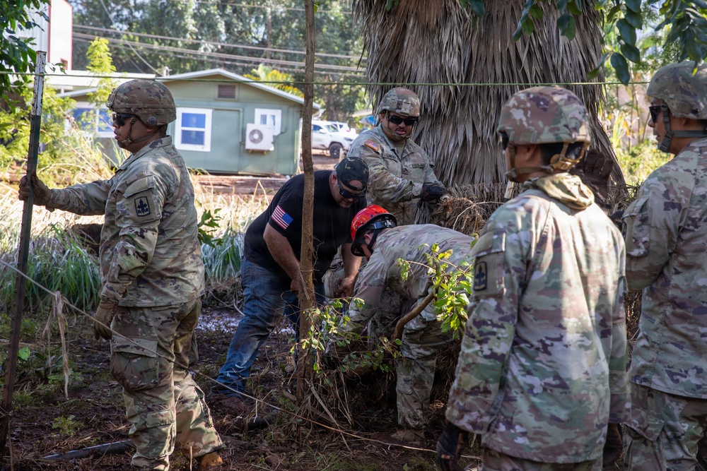 Hawaii National Guard assists Waialua residents with debris removal, water distribution
