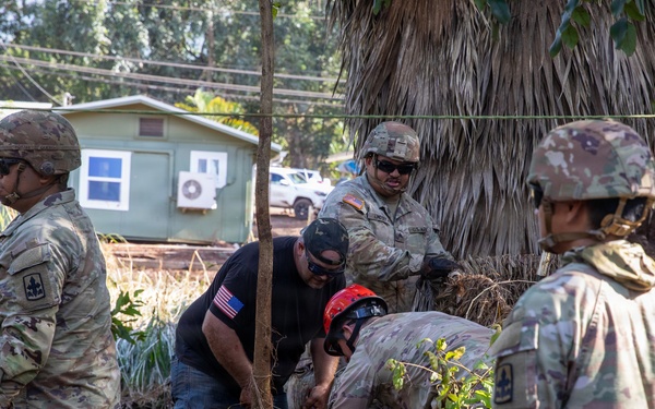 Hawaii National Guard assists Waialua residents with debris removal, water distribution