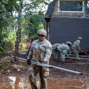 Hawaii National Guard assists Waialua residents with debris removal, water distribution