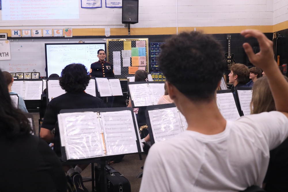 Musician Technical Assistant visits HB Plant High School for a band talk